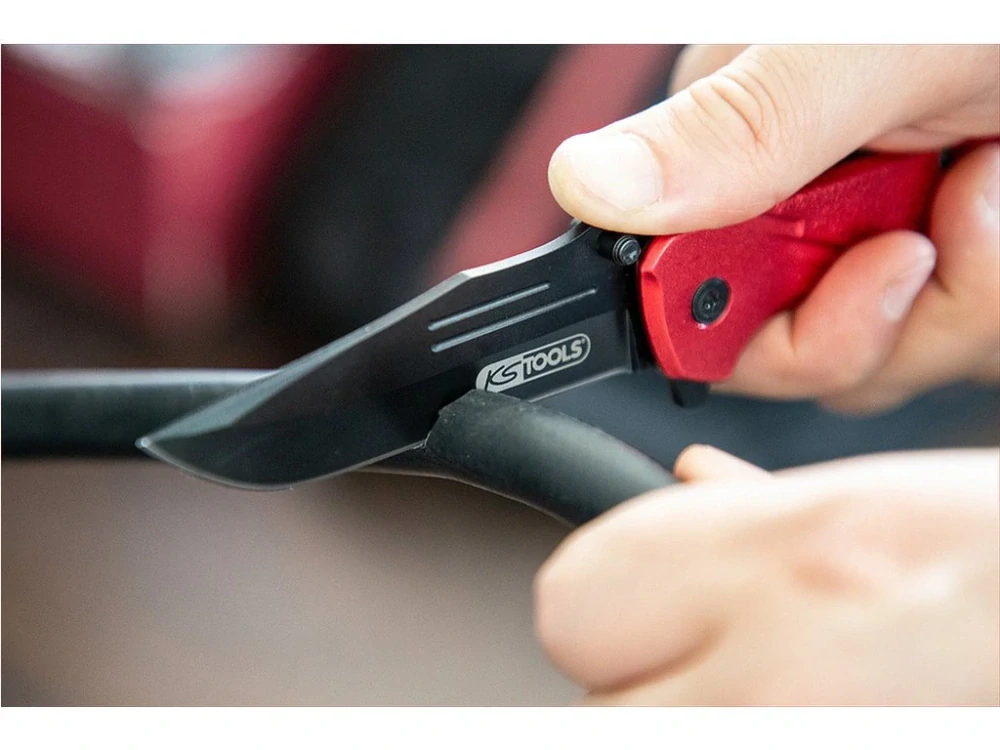 KS TOOLS 907.2220 Nůž taktický kapesní zavírací, řezač pásů a rozbíječ skla, délka 21 cm